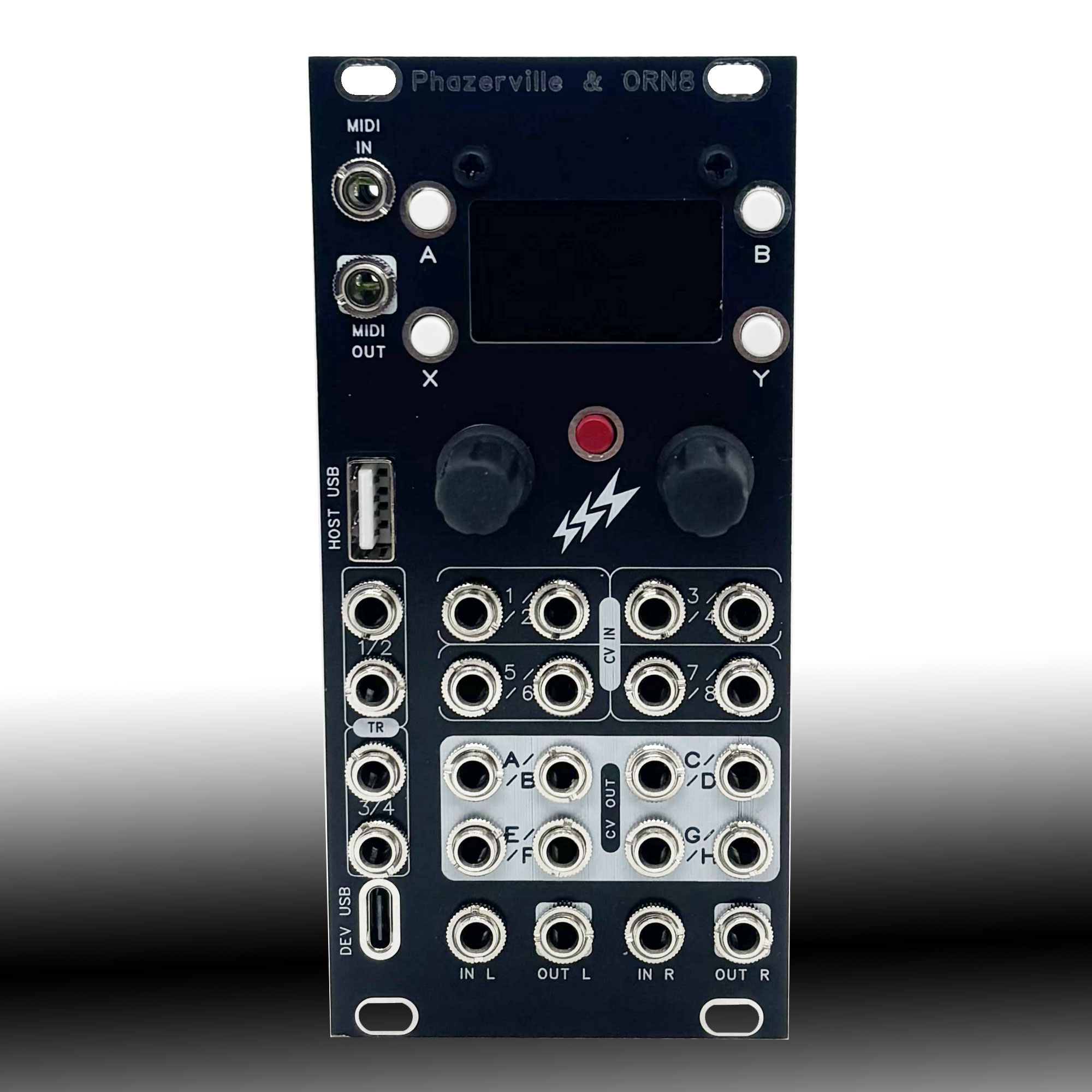 Front view of a dark modular synth panel with many 1/4-inch audio jacks arranged in rows, labeled with inputs and outputs (IN/L, IN/R, OUT, A/B, X/Y, USB, HOST) and several knobs nearby.